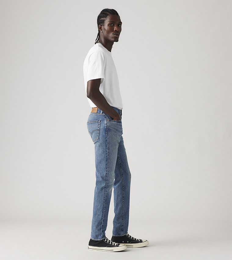 512™ Faded Slim Tapered Fit Jeans