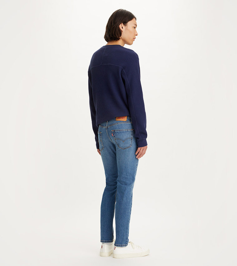 502 Mid Tapered Jeans