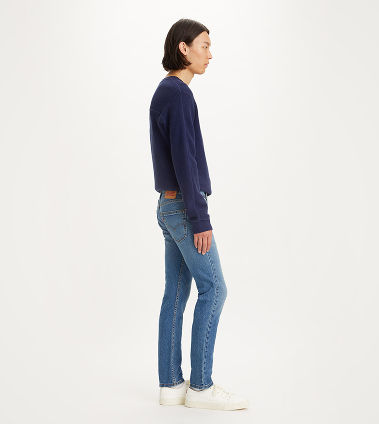 502 Mid Tapered Jeans