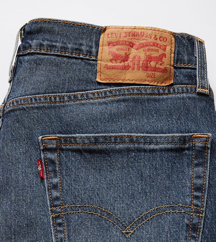 502™ Mid Tapered Jeans