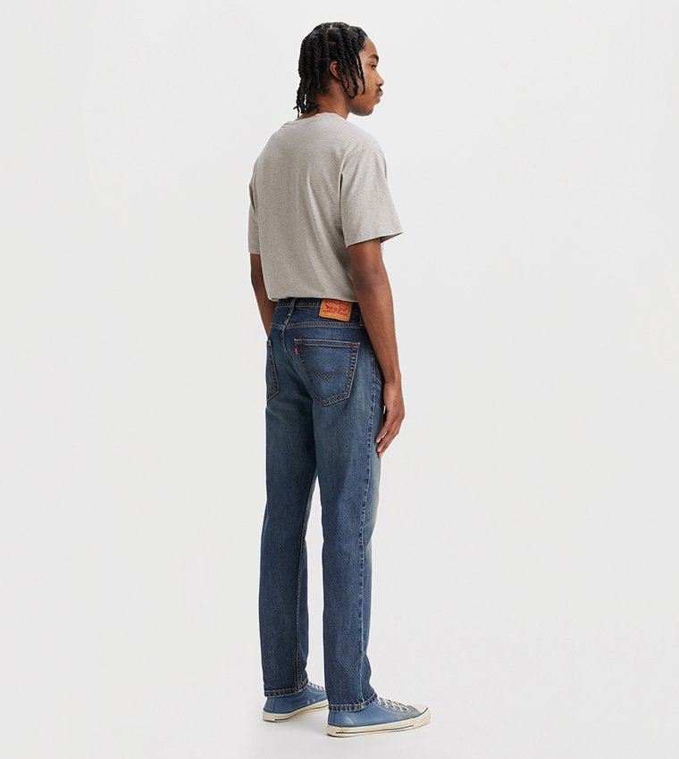 502 Faded Mid Rise Tapered Jeans