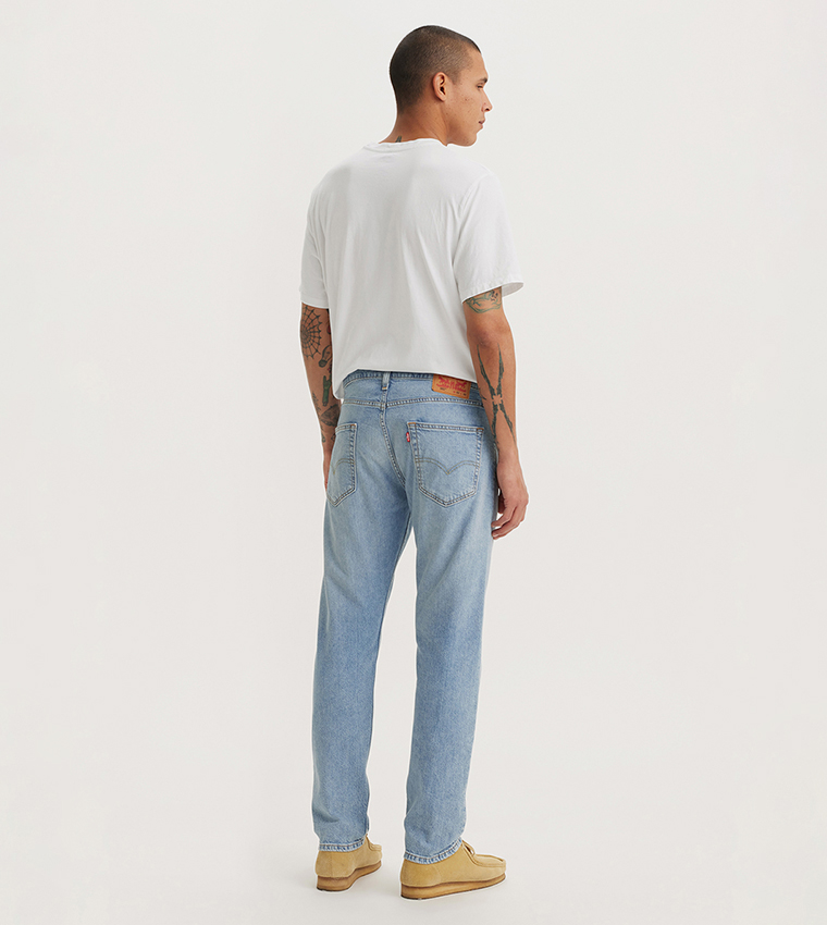 502 Faded Mid Rise Tapered Jeans