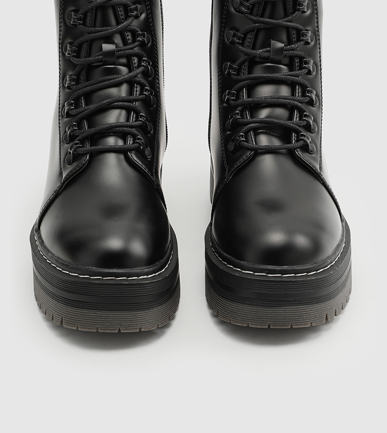 Buy Ardene Chunky Sole Combat Boots In Black 6thStreet Qatar