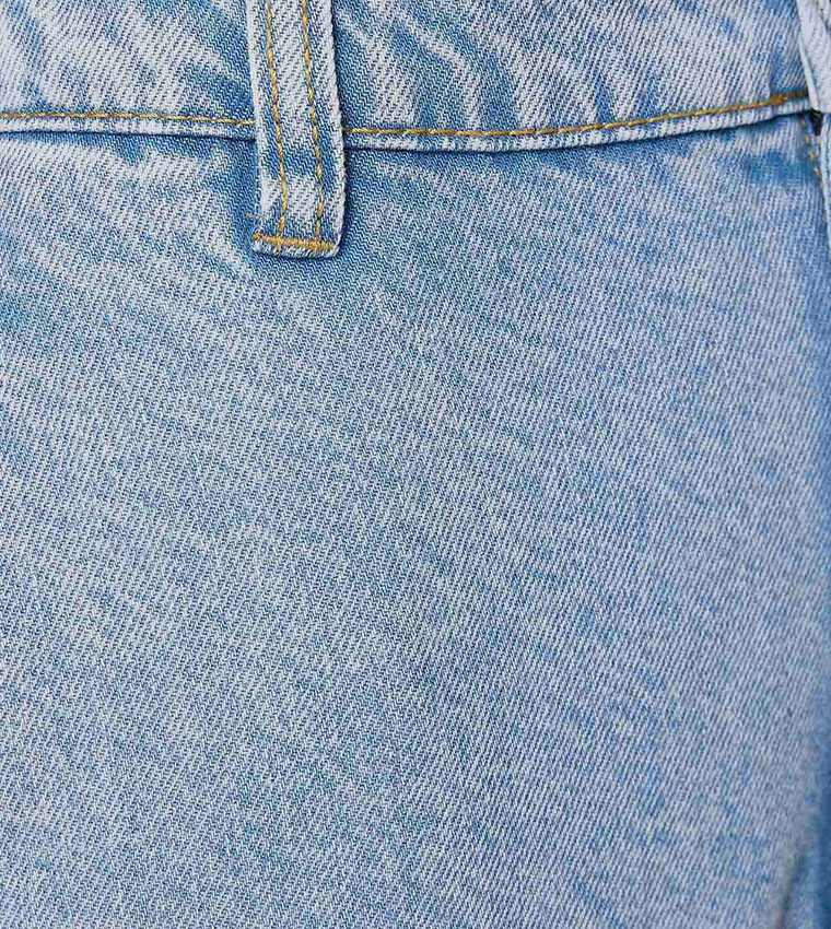 Faded Slouchy Fit Jeans with Button Closure