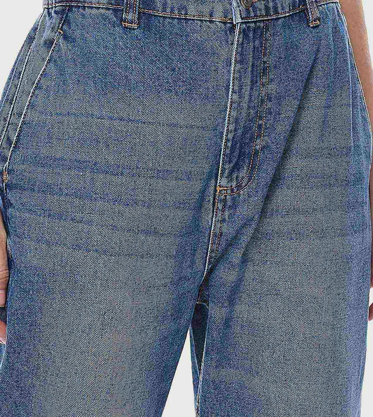 Faded Slouchy Fit Jeans with Button Closure