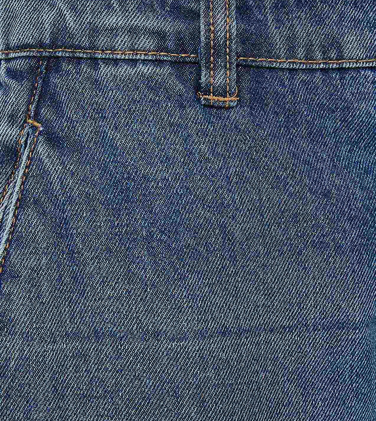 Faded Slouchy Fit Jeans with Button Closure