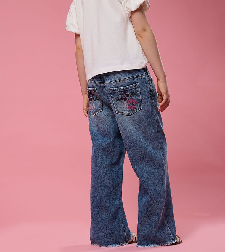 Faded Wide Leg Jeans with Button Closure