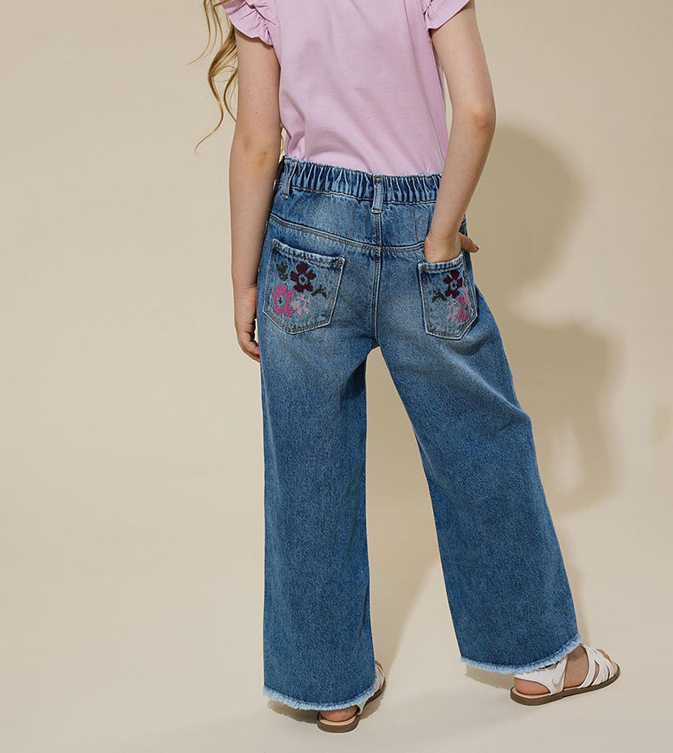Faded Wide Leg Jeans with Button Closure