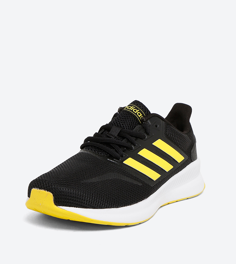 Buy Adidas Falcon K Core Black Shock Yellow Shock Yellow In Black 6thStreet Kuwait