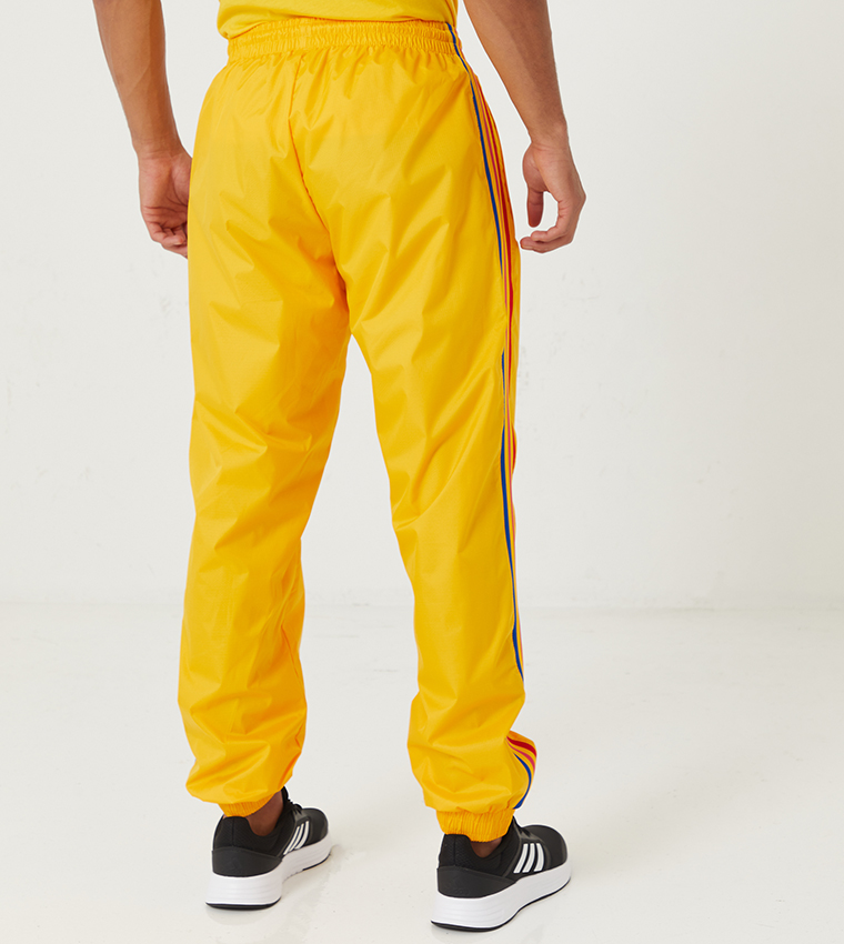 Buy Adidas 3D Trefoil 3 Stripes Track Pants Yellow In Yellow 6thStreet Qatar