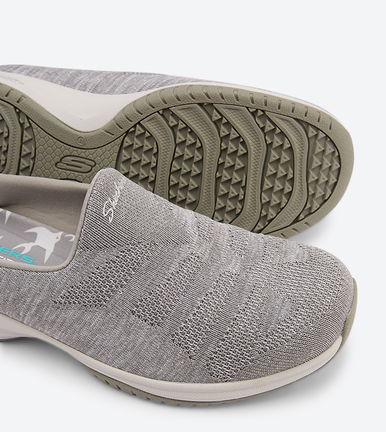 Buy Skechers Commute Time Knitastic Round Toe Slip Ons Grey In Grey 6thStreet Qatar