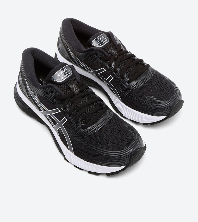 Buy Asics Gel Nimbus 21 Shoes Black Dark Grey In Black 6thStreet Bahrain