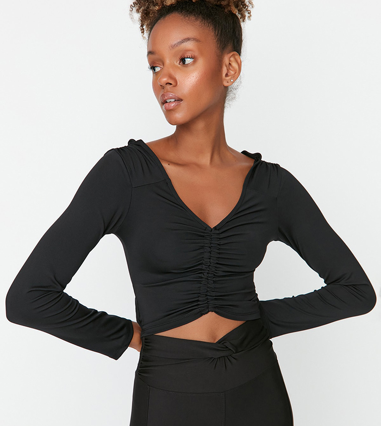 Buy Trendyol Solid V Neck Ruched Fitted Crop Top In Black | 6thStreet  Bahrain