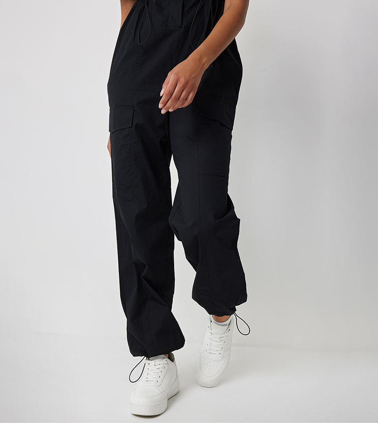 Buy Ardene Solid Cargo Parachute Jumpsuit In Black | 6thStreet Saudi Arabia