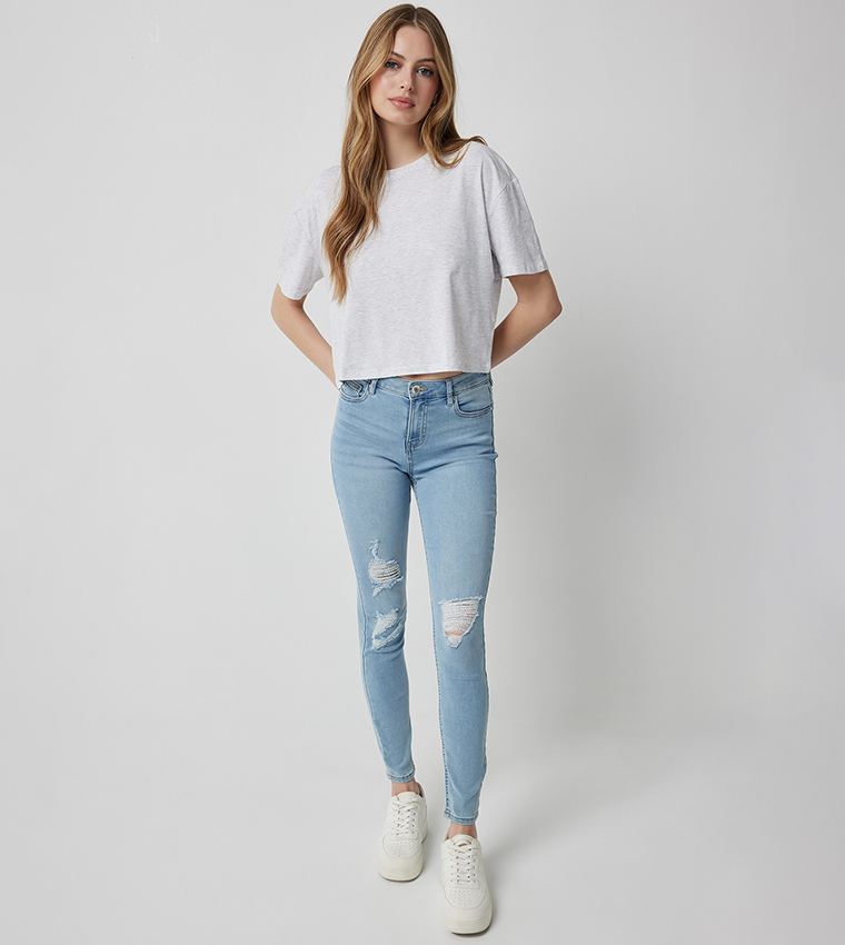 Ripped Mid Rise Skinny Fit Jeans