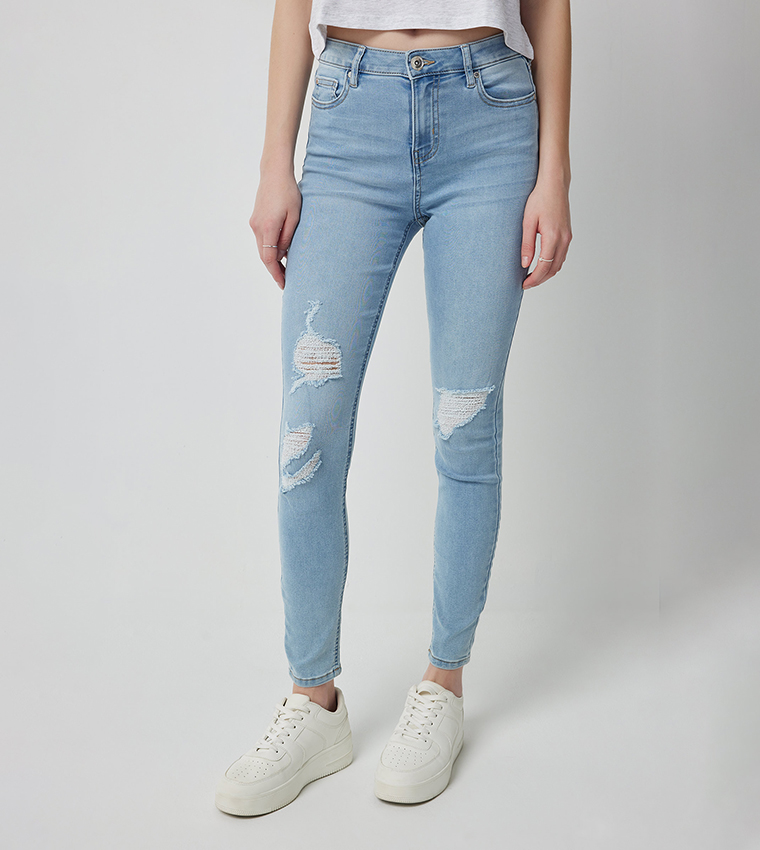 Ripped Mid Rise Skinny Fit Jeans