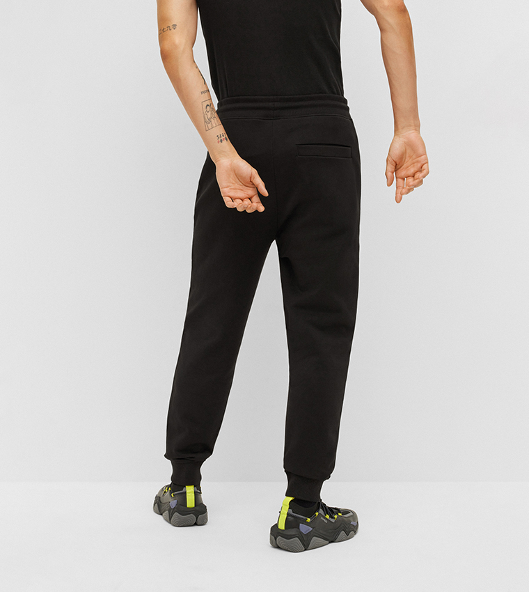 Buy Hugo Tracksuit Bottoms With Logo Label In Black