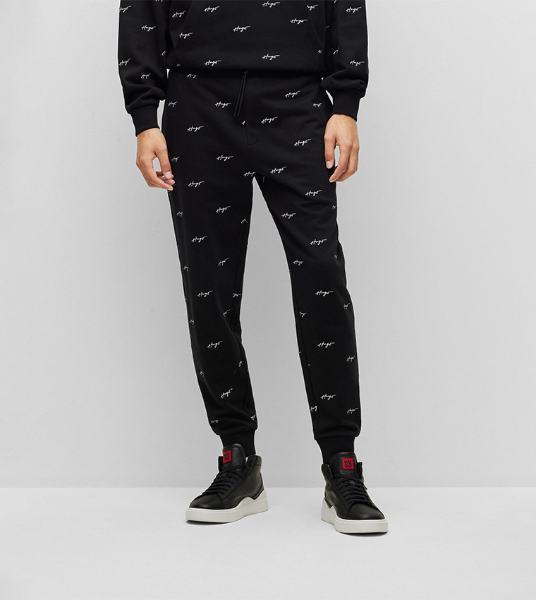 Nike swoosh all over tracksuit deals