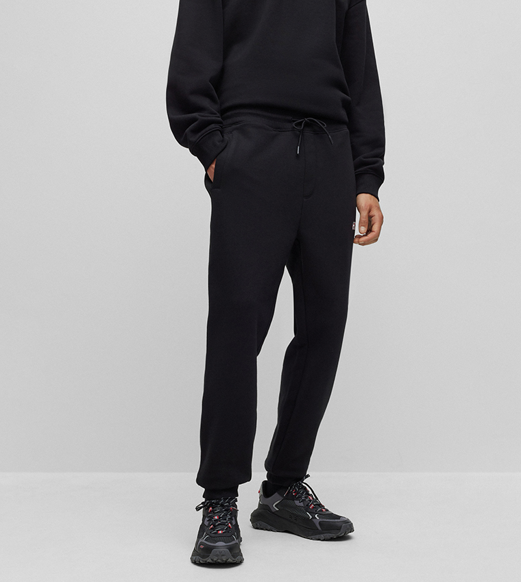 Buy Hugo Logo Printed Drawstring Waist Joggers In Black