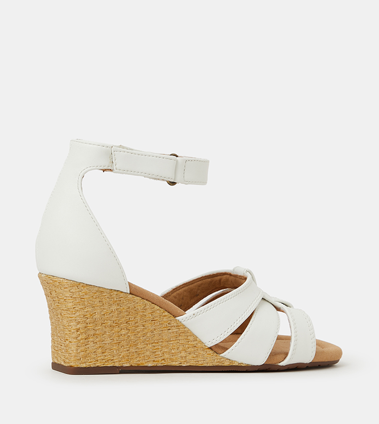 Buy Clarks Kyarra Joy Ankle Strap Wedge Sandals In White | 6thStreet Qatar