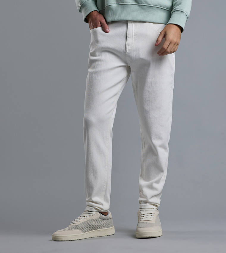 Solid Carrot Fit Jeans with Button Closure
