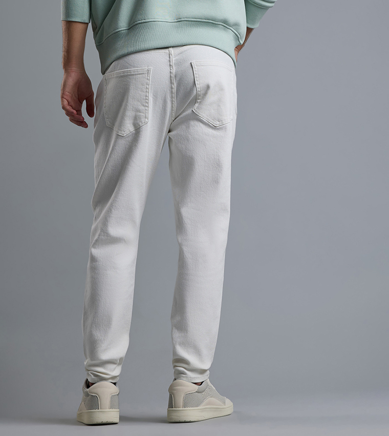 Solid Carrot Fit Jeans with Button Closure