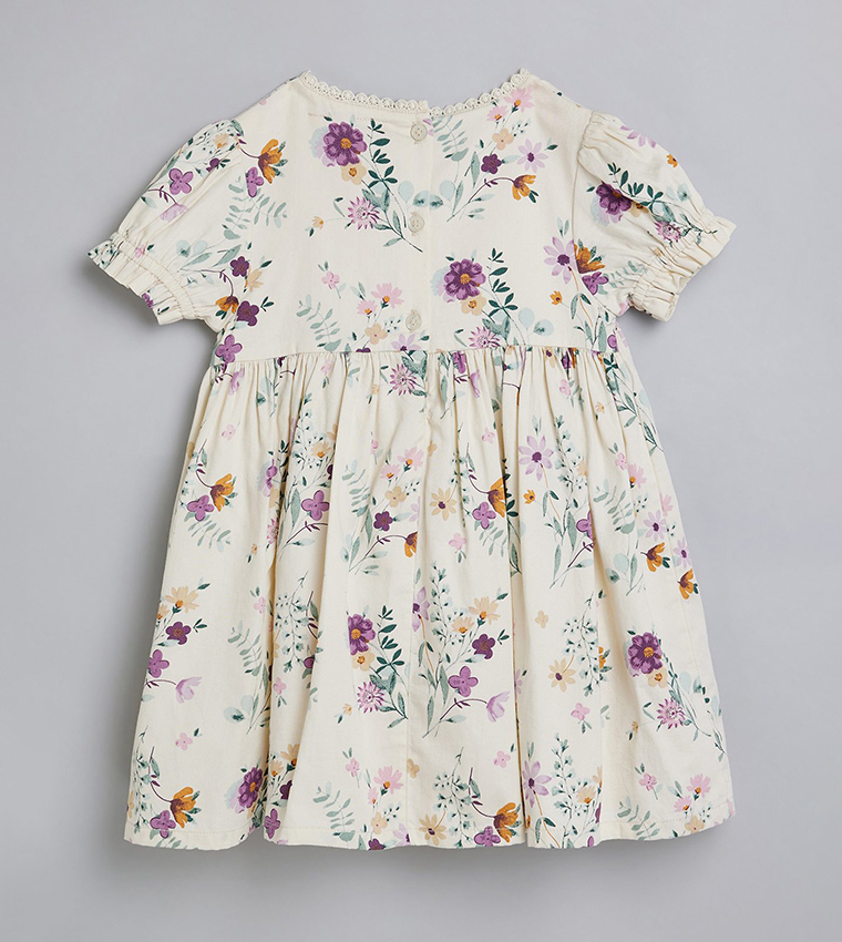 فستان فلير بطبعة الزهور وكم باف 