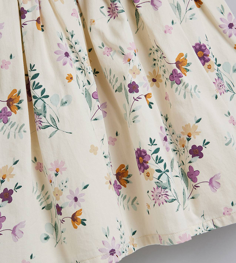 فستان فلير بطبعة الزهور وكم باف 