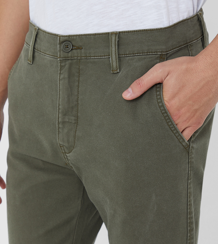 Buy Levi's Tapered Leg Chino Pants In Green | 6thStreet Qatar
