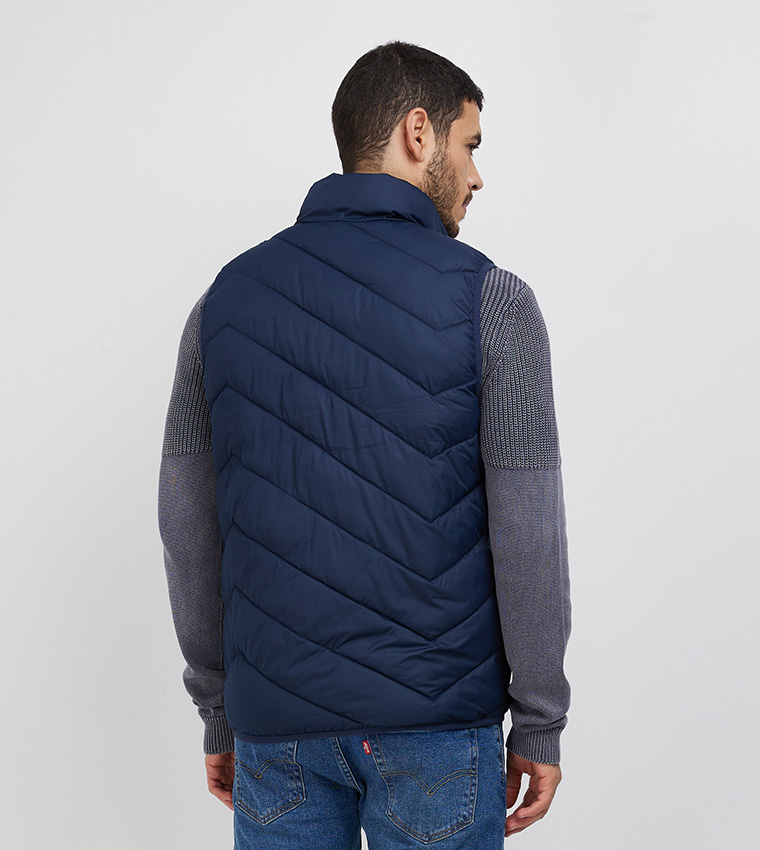 جاكيت مبطن بدون أكمام بسحاب