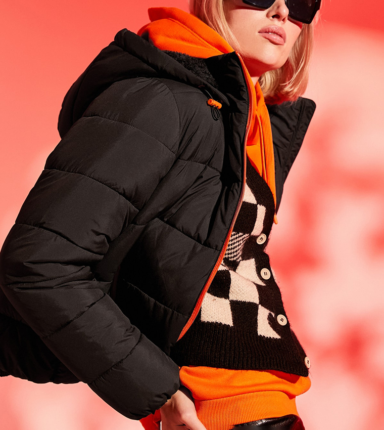 Orange and 2025 black puffer jacket