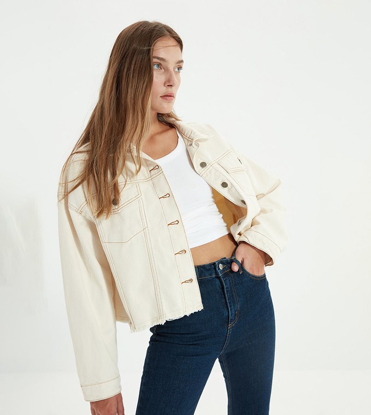 Buy Trendyol Hem Tasseled Oversize Crop Denim Jacket In Cream 6thStreet Oman