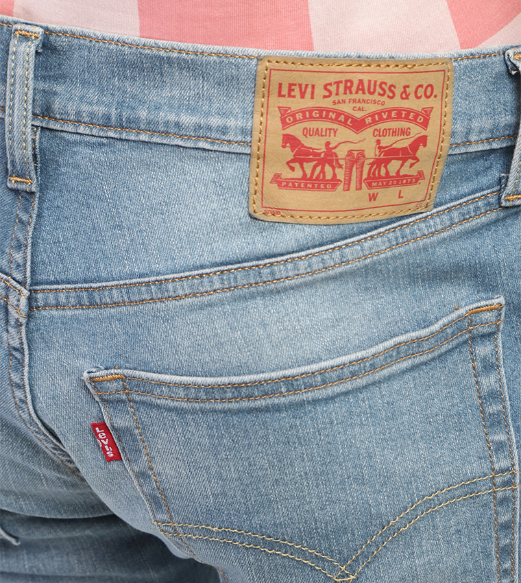 Washed Mid Rise Straight Fit Jeans
