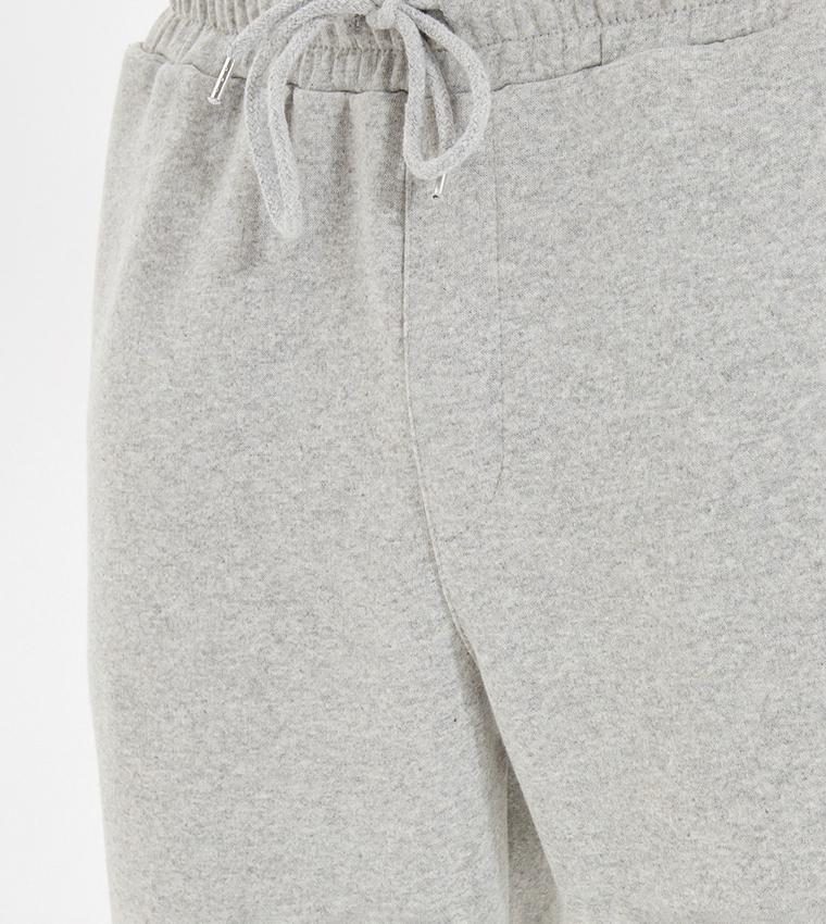 Buy Trendyol Regular Fit Open Leg Basic Joggers In Grey | 6thStreet Kuwait