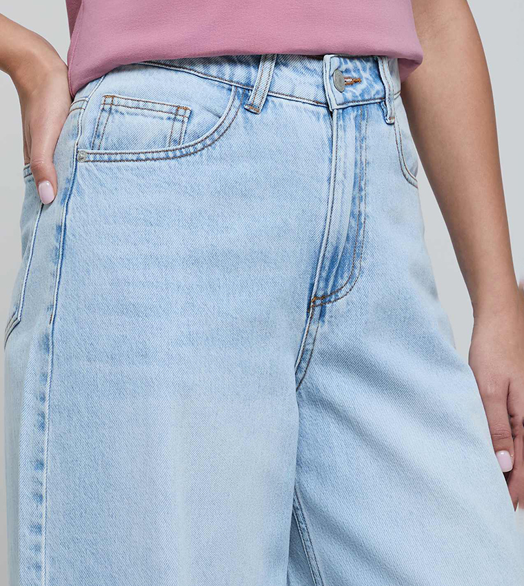 Faded Wide Leg Jeans with Button Closure