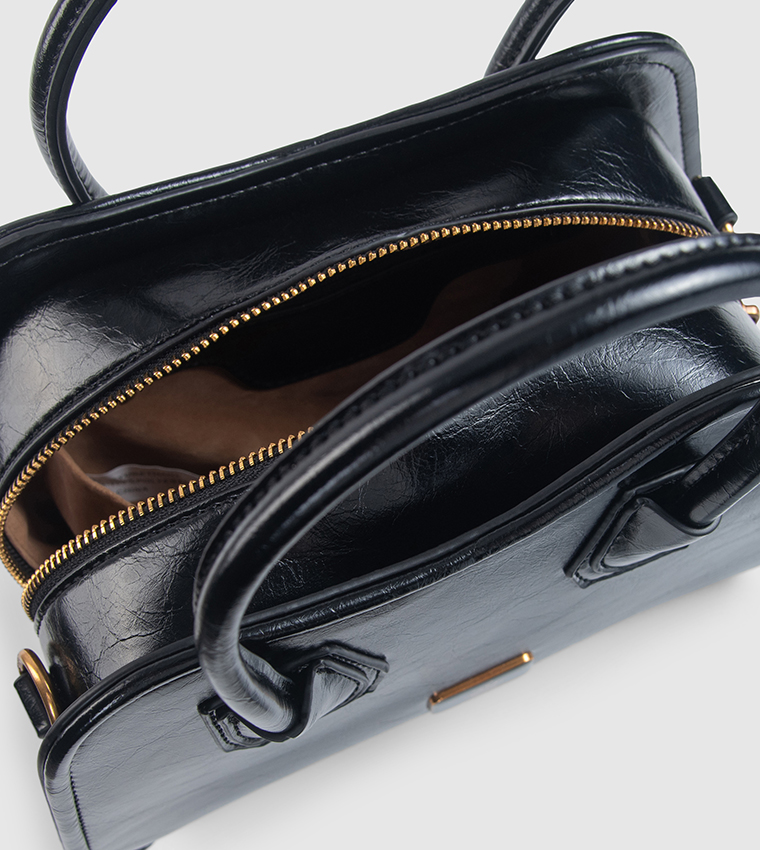 حقيبة ساتشل مزينة بشعار