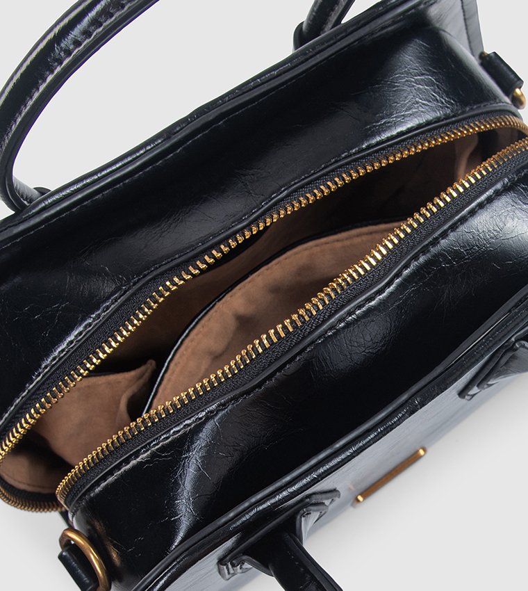 حقيبة ساتشل مزينة بشعار