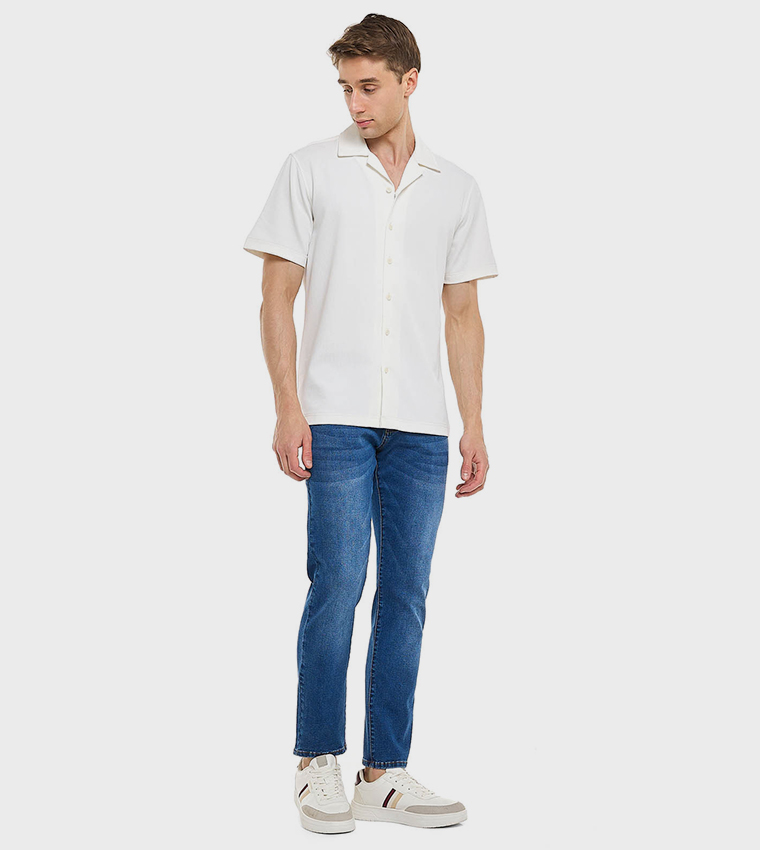 Faded Slim Fit Jeans with Button Closure
