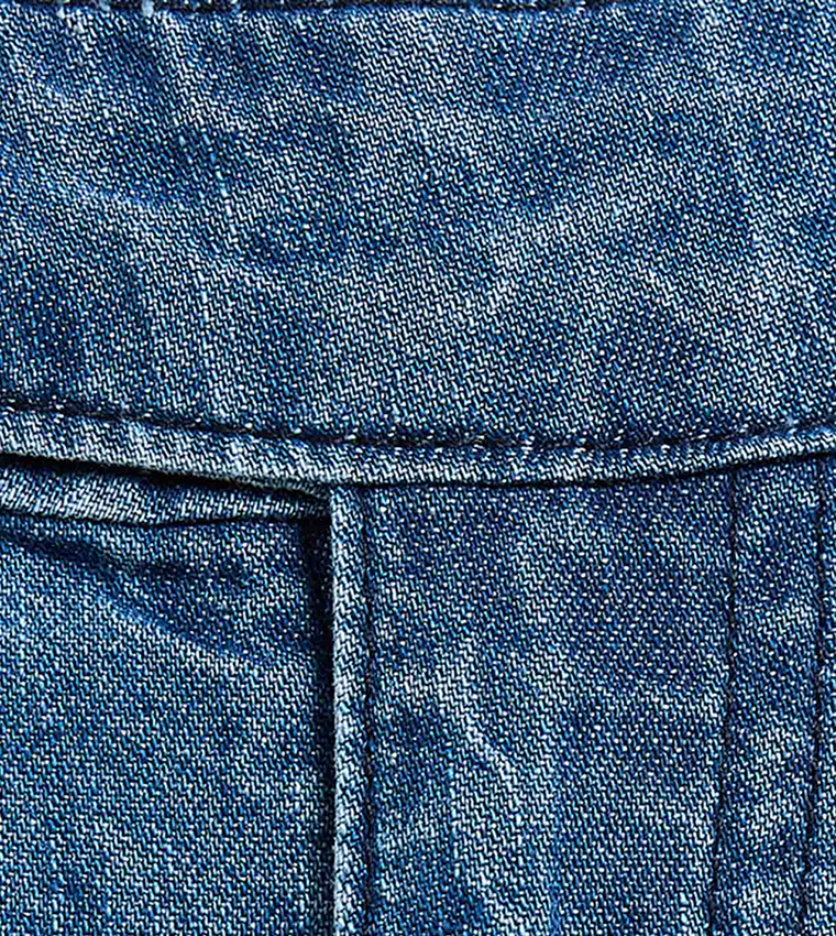 Washed Wide Leg Jeans with Button Closure