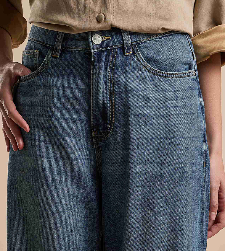 Faded Baggy Jeans with Button Closure