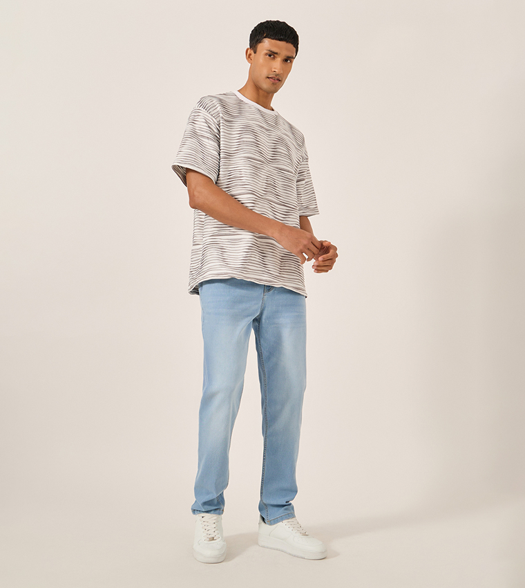 Mid Rise Faded Slim Fit Jeans