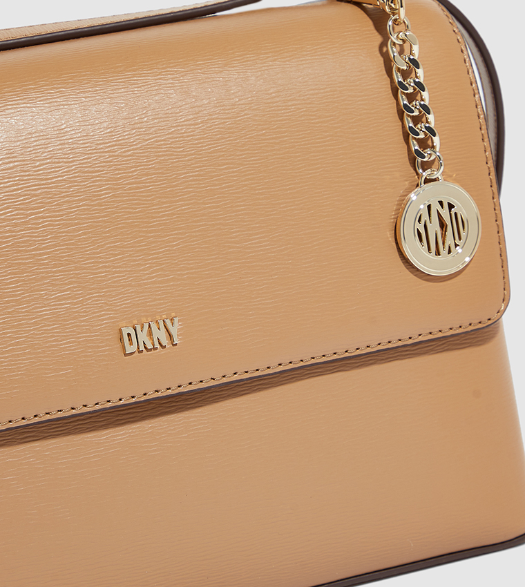 Buy Dkny BRYANT Flap Closure Crossbody Bag In Beige 6thStreet Qatar