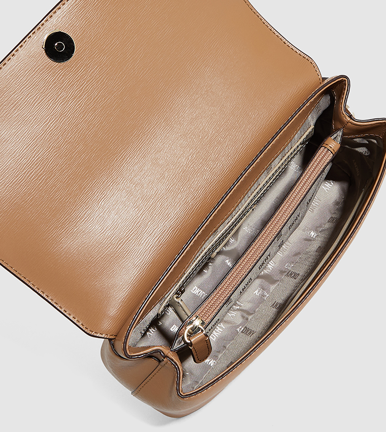 Buy Dkny BRYANT Flap Closure Crossbody Bag In Beige 6thStreet Qatar