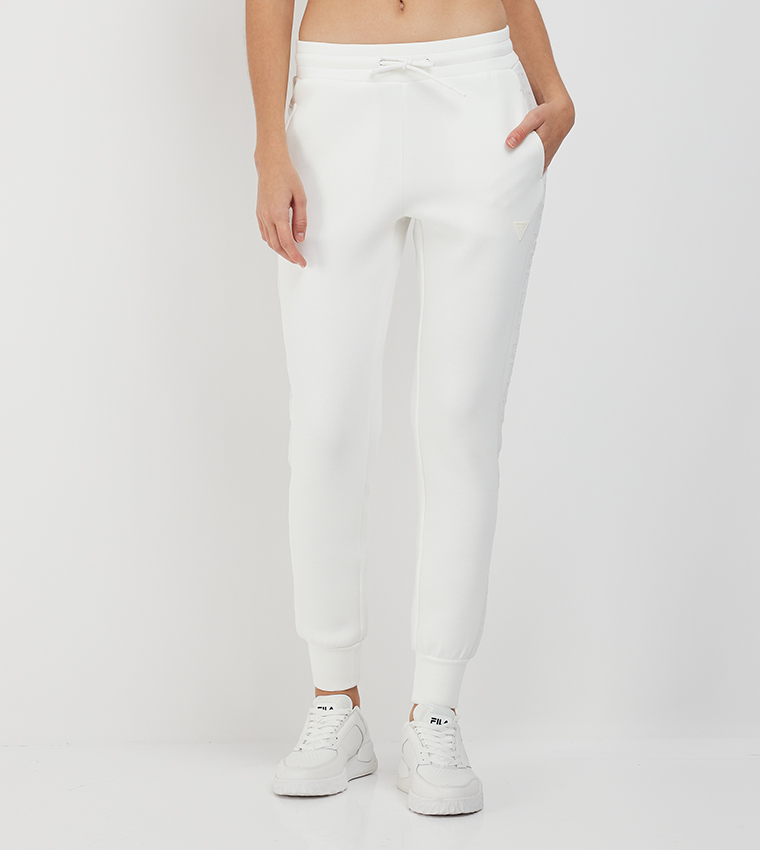 White joggers with online drawstring