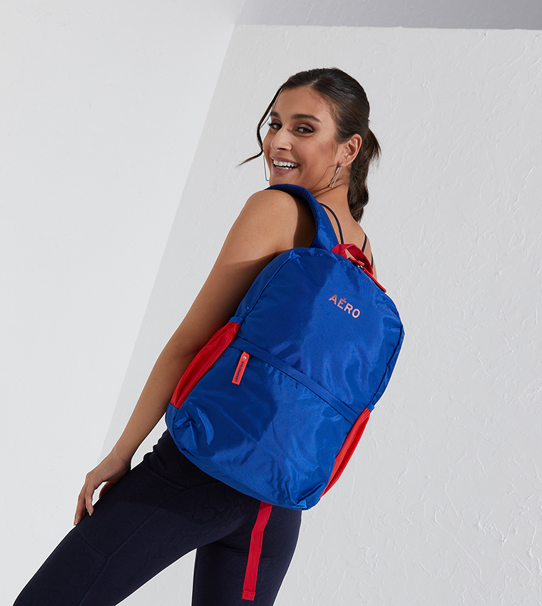Color Coordinated Backpack With Side Pockets