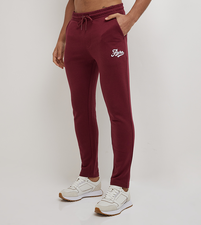 Tommy Hilfiger ribbed logo waistband sweatpants in burgundy