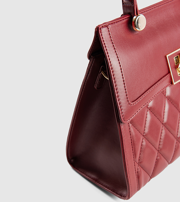 Puffer Twist Lock Top Handle Bag