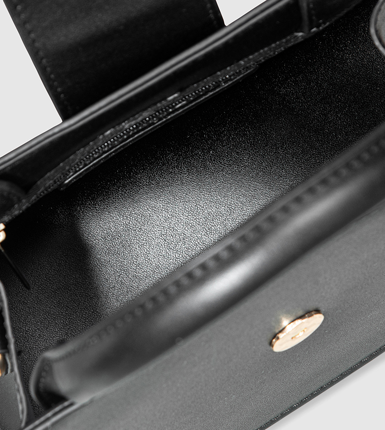 شنطة ساتشل نسائية بشعار 