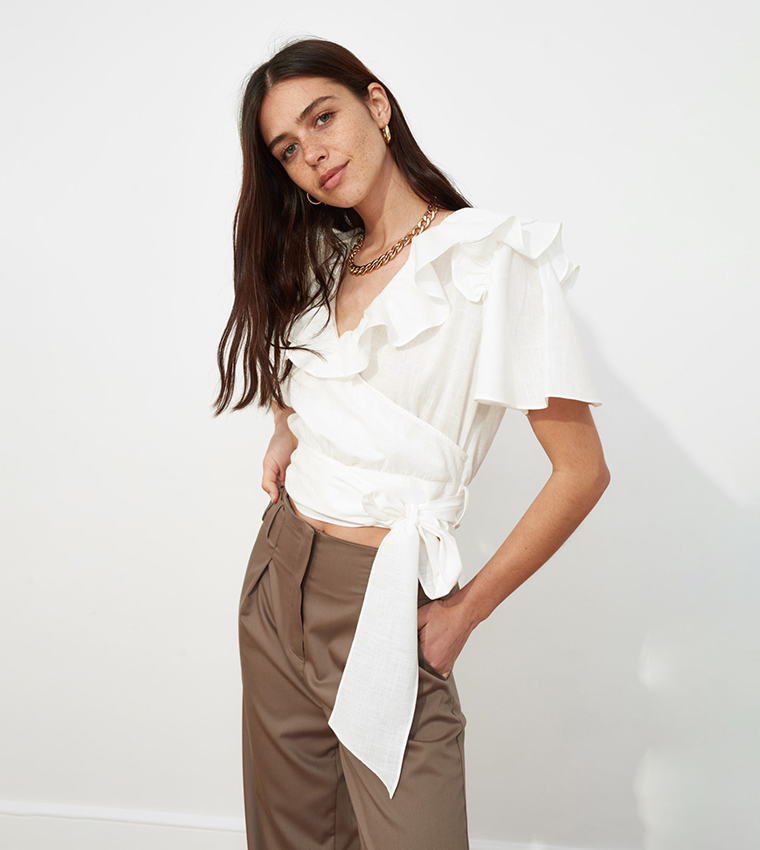 Translucent Ruffled Cropped Blouse Buy Trendyol Ruffled Crop Blouse In Beige | 6thStreet Qatar