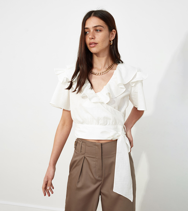 Translucent Ruffled Cropped Blouse Buy Trendyol Ruffled Crop Blouse In Beige | 6thStreet Qatar